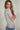 Magasinez le chandail à col en V de Colori - Shop the V-neck top from Colori