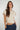 Magasinez le haut basique sans manches de Colori - Shop the sleeveless basic top from Colori