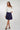 Magasinez la jupe courte plissée de Colori - Shop the mini pleated skirt from Colori