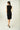 Magasinez la robe portefeuille sans manches de Colori - Shop the sleeveless wrap dress from Colori