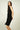 Magasinez la robe portefeuille sans manches de Colori - Shop the sleeveless wrap dress from Colori
