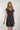 Magasinez la robe cache-coeur avec imprimé fleuri de Colori - Shop the floral print wrap dress from Colori