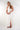 Magasinez la robe élégante à dos ouvert de la nouvelle collection de la Boutique Colori - Shop the elegant dress with open back from new collection from Boutique Colori